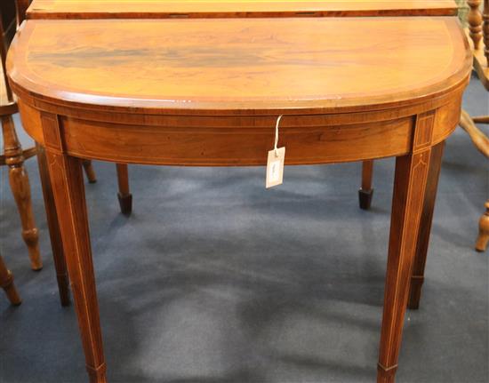 A 19th century rosewood D-shaped card table with folding top, 92cm wide